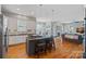 Modern kitchen featuring a central island with bar seating, sleek appliances, and ample counter space at 15830 Waterfront Dr, Huntersville, NC 28078