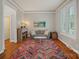 Comfortable sitting room featuring hardwood floors, a neutral color palette, and plenty of natural light at 15830 Waterfront Dr, Huntersville, NC 28078
