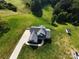 Aerial view of the property displaying the home, outbuilding and expansive lawn at 164 Vance Farm Dr, Statesville, NC 28625