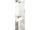 Bathroom featuring a pedestal sink with bronze fixtures at 164 Vance Farm Dr, Statesville, NC 28625