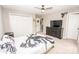 This bedroom is furnished with a ceiling fan, a dresser, a closet, and a motorcycle-themed bedspread at 164 Vance Farm Dr, Statesville, NC 28625