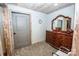 Bedroom featuring carpet and classic wooden dresser with decorative mirror at 164 Vance Farm Dr, Statesville, NC 28625