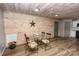 Dining area showcasing a glass table set for four with unique decor at 164 Vance Farm Dr, Statesville, NC 28625
