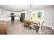 Eat-in kitchen with stainless steel appliances, a breakfast nook, and access to outdoor deck at 164 Vance Farm Dr, Statesville, NC 28625