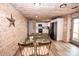 Eat-in kitchen features wood paneling, stainless steel appliances, and a modern design at 164 Vance Farm Dr, Statesville, NC 28625