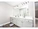 Main bathroom with double sink vanity and modern lighting fixtures, perfect for a growing Gathering at 164 Vance Farm Dr, Statesville, NC 28625