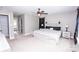 Spacious main bedroom with a decorative ceiling fan and neutral decor at 164 Vance Farm Dr, Statesville, NC 28625