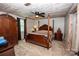 Spacious main bedroom features a classic four-poster bed and matching wooden furniture at 164 Vance Farm Dr, Statesville, NC 28625