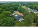 This stunning home is nestled in the woods and features an amazing pool! at 20000 Schooner Dr, Cornelius, NC 28031