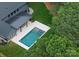 This aerial view shows the house, in-ground pool, backyard, and beautiful neighborhood at 20000 Schooner Dr, Cornelius, NC 28031