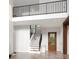 Bright entryway with hardwood floors, staircase, and a view of the upper level at 20000 Schooner Dr, Cornelius, NC 28031