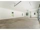 This large garage is very well lit and has lots of windows at 20000 Schooner Dr, Cornelius, NC 28031