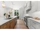 Bright kitchen featuring a large island, modern appliances, stylish cabinetry, and an open layout for easy entertaining at 20000 Schooner Dr, Cornelius, NC 28031