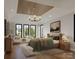 Serene bedroom with wood-paneled ceiling, large windows, and stylish decor at 20000 Schooner Dr, Cornelius, NC 28031