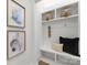 A well-organized mudroom with decor offers both style and practicality at 20000 Schooner Dr, Cornelius, NC 28031
