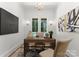 Bright office space with natural light, a modern desk, and decor that creates a professional work environment at 20000 Schooner Dr, Cornelius, NC 28031