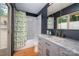 Bathroom with a stylish vanity, a shower-tub, and access to an outside private space at 2298 Wintercrest Dr, Rock Hill, SC 29732