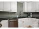 Kitchen with white cabinets, stainless steel appliances, granite countertops, and green tile backsplash at 2298 Wintercrest Dr, Rock Hill, SC 29732