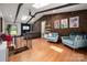 Large living room featuring hardwood floors, modern décor, and backyard views at 2298 Wintercrest Dr, Rock Hill, SC 29732