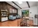 Living area with hardwood floors, art display and access to the outdoor deck at 2298 Wintercrest Dr, Rock Hill, SC 29732