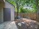 Private backyard featuring a storage shed, wooden fence, and mature trees, providing a secluded outdoor space at 2324 Brookview Ct, Rock Hill, SC 29732