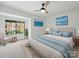 Serene bedroom with blue accents, a large window, and a cozy seating area, offering a relaxing retreat at 2324 Brookview Ct, Rock Hill, SC 29732