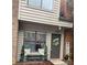 Charming home entrance with a wreath, bench, and welcome sign creating an inviting curb appeal at 2324 Brookview Ct, Rock Hill, SC 29732