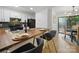 Modern kitchen with white cabinets, a breakfast bar with stylish seating, and stainless steel appliances at 2324 Brookview Ct, Rock Hill, SC 29732