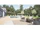 Backyard with a beautiful in-ground pool and outdoor furniture perfect for relaxing at 2413 Cross Country Rd, Charlotte, NC 28270