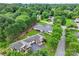 Expansive aerial view showcasing the home's desirable location within a wooded neighborhood at 2561 26Th Ne Ave, Hickory, NC 28601