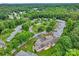 Expansive aerial view of a neighborhood in a verdant, tree-filled landscape at 2561 26Th Ne Ave, Hickory, NC 28601