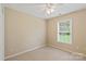 Cozy bedroom with carpeted floor, a neutral wall color and a large window that provides ample natural light at 2561 26Th Ne Ave, Hickory, NC 28601