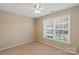 Bedroom with a large sunny window and a ceiling fan for comfort at 2561 26Th Ne Ave, Hickory, NC 28601