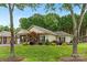 Charming single-story home with manicured lawn and mature trees at 2561 26Th Ne Ave, Hickory, NC 28601