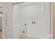 Laundry room with shelving and utility hookups at 2561 26Th Ne Ave, Hickory, NC 28601