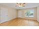 Bright, open room with bamboo flooring, ceiling fan, and view of the front yard at 2561 26Th Ne Ave, Hickory, NC 28601