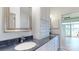 Elegant bathroom with double sinks, and direct access to the living room at 401 Lake Club Dr, Rock Hill, SC 29732