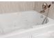 A luxurious white jetted bathtub for a relaxing and spa-like experience at 401 Lake Club Dr, Rock Hill, SC 29732