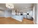Eat-in kitchen featuring stainless steel appliances, an island, and custom lighting at 401 Lake Club Dr, Rock Hill, SC 29732