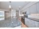 Kitchen with island, gas stovetop, and granite countertops at 401 Lake Club Dr, Rock Hill, SC 29732