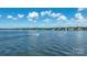 Expansive lake view featuring a boat cruising across the calm water under a partly cloudy sky at 401 Lake Club Dr, Rock Hill, SC 29732