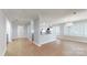 Open-concept living space featuring hardwood flooring and an eat-in kitchen at 401 Lake Club Dr, Rock Hill, SC 29732