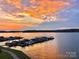 Sunset view of a marina filled with boats, creating a picturesque waterfront scene at 401 Lake Club Dr, Rock Hill, SC 29732