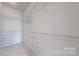 Spacious walk-in closet with white wire shelving for optimal organization and storage at 401 Lake Club Dr, Rock Hill, SC 29732