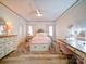 Bright bedroom with a ceiling fan, vanity and a neutral color palette offering a calming and stylish atmosphere at 4025 Foxes Trl, Cramerton, NC 28032