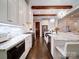 This modern kitchen offers marble countertops, stainless steel appliances, and hardwood flooring at 4025 Foxes Trl, Cramerton, NC 28032