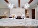 Kitchen showcasing an expansive island with marble countertops and pendant lighting at 4025 Foxes Trl, Cramerton, NC 28032