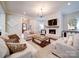 Comfortable living space with fireplace and seamless transition to a formal entry at 4025 Foxes Trl, Cramerton, NC 28032