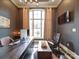 Inviting office space with dark walls, a large window, and a sleek modern desk at 4025 Foxes Trl, Cramerton, NC 28032