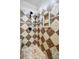 Shower with a bronze shower head, built-in shelves, and decorative tiled walls at 4133 Hoffmeister Dr, Waxhaw, NC 28173